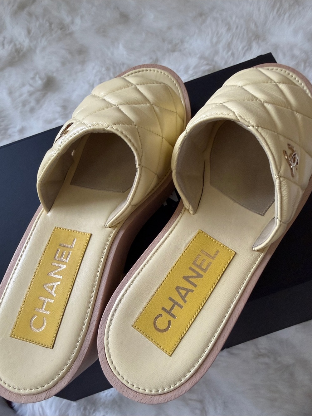 CHANEL Quilted Slide Mules in Pale Yellow